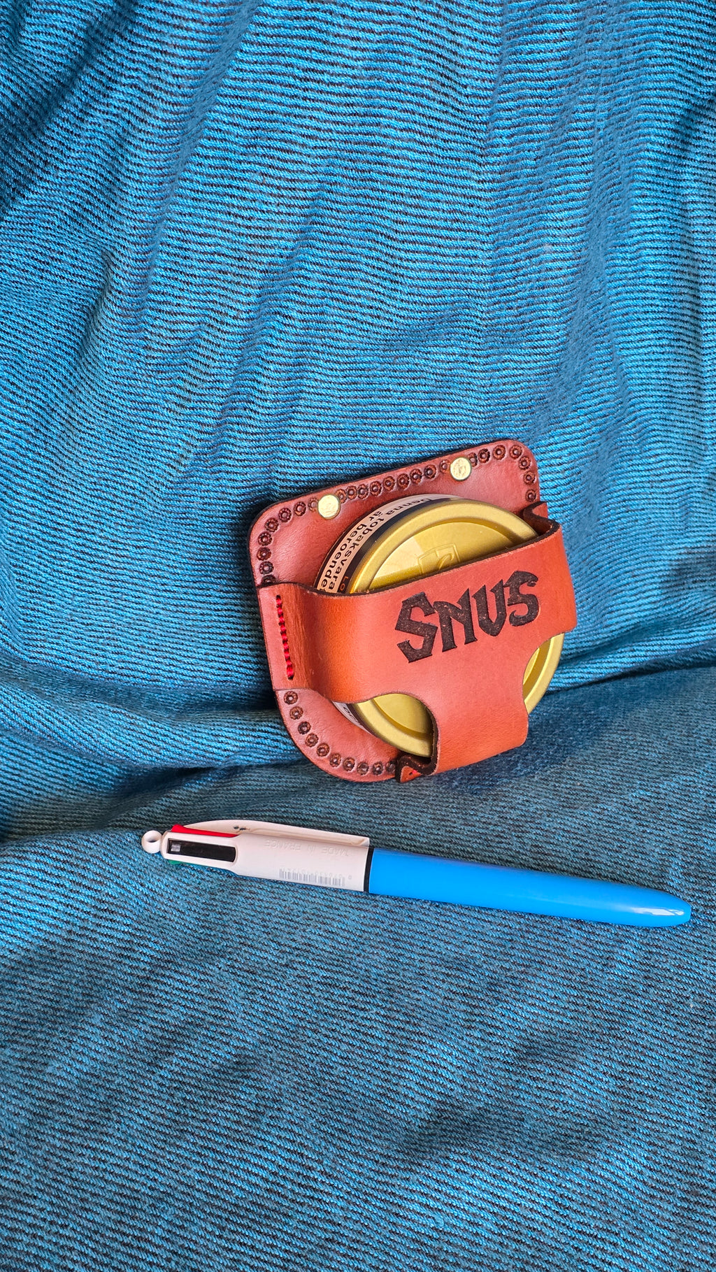 Bälteshållare för snusdosa